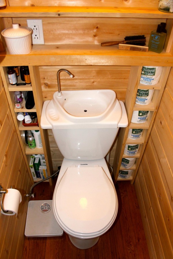 Tiny house cabine featuring a toilet sink combo